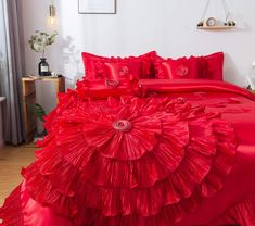 PRICES MAY VARY. Chic design: a chic design that is sure to add a bold statement to your bedroom with a rich solid bright bold red color. Comfort and warmth: this satin queen comforter set has a soft and cozy inner lining, and is thick enough to keep you warm throughout the year Flowing layered pleated ruffles all around the comforter and pillow covers. It has a large bright red rose as the centerpiece and small roses around the design. Care instructions: Dry clean preferred, wash on cold delica Pretty Beds, Rose Comforter, Bathroom Things, Ruffle Comforter, Red Bed, King Size Comforter, Luxury Beds, Wedding Bed, Round Bed