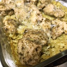 a casserole dish with chicken, rice and mushrooms in it is ready to be eaten