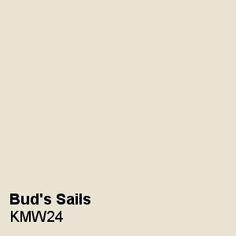 a white wall with the words bud's sails kmw2 - 4