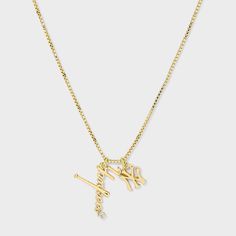 Elevate your game day style with the Bijoux Sport by Luv Aj MLB Charm Necklace. Regardless of which team you’re rooting for, we’ve got the perfect pieces to help you show off your team spirit. This necklace features a sleek charm crafted from high-quality gold-plated brass, ensuring durability and a polished metal finish. The necklace is adorned with an eye-catching logo charm of your favorite MLB team. High quality but also affordable, these pieces are built to endure much more than a nine-inni Luxury Gold Charm Necklace With Logo, Gold Necklace With Logo Charm, Ny Necklace, Yankees Necklace, Sporty Personalized Necklaces For Sports, Luv Aj, Mlb Teams, Brass Charms, New York Yankees