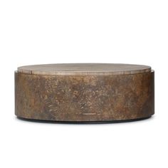 a round wooden table with a metal base and wood grain on the top, against a white background