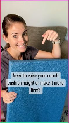 a woman sitting on a couch holding up a sign that says need to raise your couch cushion height or make it more firm?