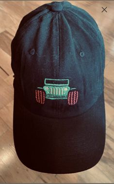 Jeep embroidered baseball cap  Black Hat with Green Jeep, Red tires and gray grill.  If you would like alternate colors please message me.. Jeep Hats For Women, Trucker Dad Hat For Baseball Season, Trucker Style Dad Cap For Baseball Season, Embroidered Trucker Baseball Cap, Jeep Black, Embroidery Hats, Green Jeep, Hat Embroidery, Embroidered Hat