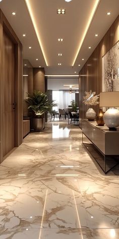 a long hallway with marble flooring and lighting