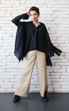 Plus Size Maxi Shirt - METSh0015 A wonderful black loose tunic inspired by fashion and all the brave women who are not afraid to show their style! This asymmetric top is super easy to wear and can be worn on any occasions. Pair it with a nice pair of pants and you are ready to show off! This maxi top is made of linen. See it in white here: https://www.etsy.com/listing/602330271/new-white-maxi-linen-shirtoversize-loose?ref=shop_home_active_1 WHEN YOU PLACE AN ORDER YOU MUST LEAVE A TELEPHONE NUMB Black Oversized Tunic For Spring, Oversized Black Tunic For Spring, Black Lagenlook Blouse For Spring, Lagenlook Tunic Blouse Relaxed Fit, Black Lagenlook Blouse With Asymmetrical Hem, Oversized Chic Black Tunic, Oversized Black Chic Tunic, Chic Black Oversized Tunic, Chic Oversized Black Tunic