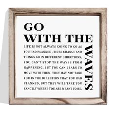 a framed print with the words go with the waves in black and white on it