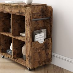 an old wooden bookcase with two compartments on wheels