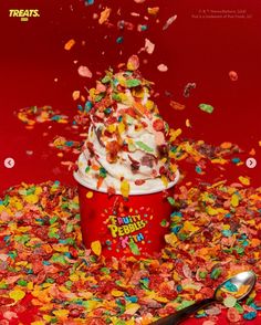 an ice cream sundae with sprinkles and confetti