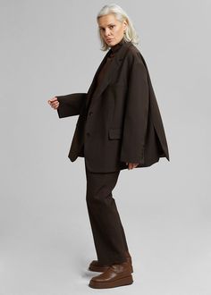 Color: Dark EspressoMidweight suiting fabric with light stretchHighly oversized boxy silhouettePeak lapels Flap front pocketsBack double vented hemButton cuffsDouble button front closureSatin lining 96% Polyester 4% Spandex
Lining: 100% Polyester Dry Clean By The Frankie Shop. Imported