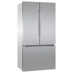 a silver refrigerator freezer sitting on top of a white wall