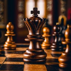 a chess board with pieces on it and the king's crown in the middle