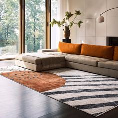 a living room with a large sectional couch