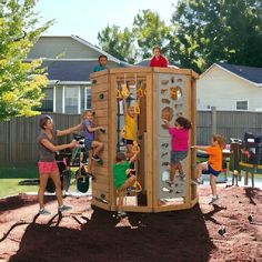 children playing in a wooden play structure