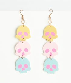 These adorable little skulls bring a playful twist to any outfit, featuring vibrant pastel colors that are sure to turn heads. Made with a lightweight design and easy fish hook backs, you can rock these cuties all day without a care in the world.Available while supplies last. Piercings Cute, Crazy Earrings, Goth Gifts, Pastel Accessories, Creepypasta Oc, Goth Accessories, Pastel Candy, Skull Earrings, Metal Accessories