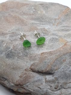 Green Lizard sea glass sterling silver stud earrings only 1 available  Found at The Lizard beach Green Sea Glass Jewelry, Silver Sea Glass Earrings For Gift, Silver Sea Glass Earrings For Beach, Minimalist Nickel Free Sea Glass Jewelry, Minimalist Nickel-free Sea Glass Jewelry, Green Sea Glass Earrings For Gift, Silver Hypoallergenic Sea Glass Earrings, Silver Hypoallergenic Earrings With Sea Glass, Hypoallergenic Silver Sea Glass Earrings