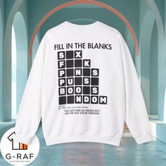 Discover our Fill in the Blanks Sweatshirt - a unique blend of comfort and humor! This funny crossword jumper is the perfect casual wear, designed to bring smiles with its clever word puzzle print. Ideal for any situation, this unisex crewneck is crafted from a 50% polyester and 50% cotton blend, ensuring the design stays fresh and beautiful wear after wear. Ribbed knit collars keep their shape, and say goodbye to itchy side seams. Gift this fun graphic sweater for a truly memorable and cozy surprise! Sweater Sayings, Word Puzzle, Blank Sweatshirts, Funny Sweaters, Graphic Sweaters, Word Puzzles, Funny Sweatshirts, Ribbed Knit, Casual Wear