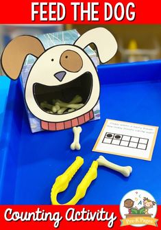 a dog themed counting activity with the words feed the dog on it's front