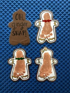 three ginger shaped cookies with the words oh, ginger snap written on them