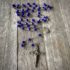 The Beads: Cobalt blue pressed glass beads from the Czech Republic. The Crucifix & Center: The same friend I got the beads from went to the Czech Republic, roughly 20 years ago. She was visiting a local glass factory there. One of the owners helped her put together her bead order. Before she left he pulled out a dusty box containing these beauties. This crucifix features glass rhinestones. Why I Make Rosaries: As far back as I can remember my grandmother prayed the rosary at least 2 times a Praying The Rosary, The Rosary, My Grandmother, The Czech Republic, Pressed Glass, Nashville Tn, Rosary, Czech Republic, Czech Glass