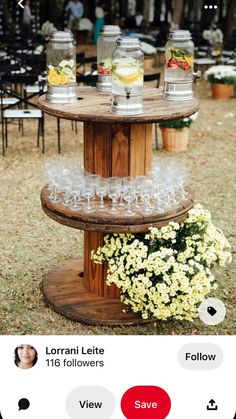 a wooden table topped with glasses filled with drinks