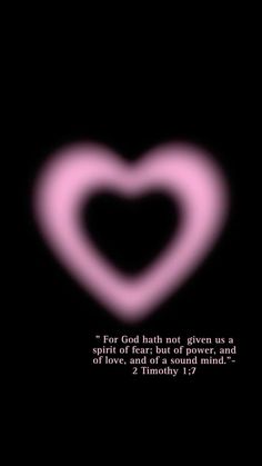 a pink heart in the middle of a black background