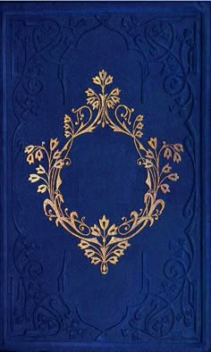 an ornate blue book with gold trimming