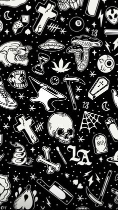 a black and white pattern with skulls, stars, and other things on it's surface