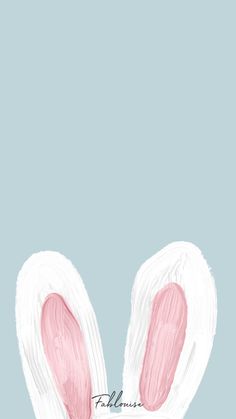 two white and pink bunny ears on a blue background