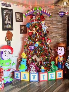 a christmas tree decorated with toys and decorations