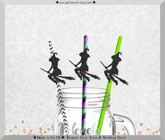 three silhouettes of witches riding on brooms in a mason jar with paper straws