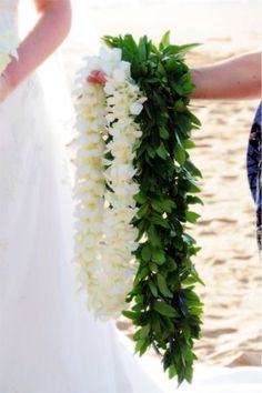 the bride and groom are getting ready to walk down the aisle