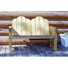 a wooden bench sitting on top of a wooden deck next to a potted plant