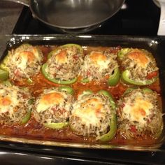 an image of stuffed peppers cooking in the oven