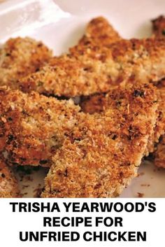 fried chicken pieces on a white plate with the words trisha yearwood's recipe for unfried chicken