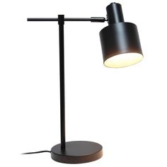 a black lamp with a white light on it