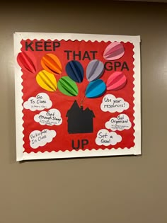 a bulletin board with colorful paper cutouts on it that says keep that gra up