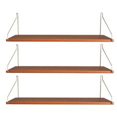 three wooden shelves with metal handles on each shelf, one is empty and the other has two