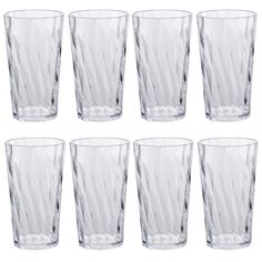 set of six clear glass tumblers on white background