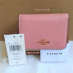 Nwt Coach Candy Pink Small Trifold Wallet In Colorblock Product Details: Color: Candy Pink/Multi Gold Tone Hardware Crossgrain Leather 2 Credit Card Slots Id Window Full-Length Bill Compartment Snap Closure Outside Zip Coin Pocket 4" (L) X 3 1/4" (H) X 1 1/2" (W) Style No: 2923 Mfsrp: $150.00 Compact Coach Wallet, Coach Bifold Coin Purse With Card Slots, Compact Coach Trifold Wallet With Card Slots, Elegant Compact Coach Trifold Wallet, Coach Bifold Coin Purse Gift, Formal Coach Card Holder, Compact Coach Wallet As Gift, Coach Bifold Wallet As Gift, Formal Rectangular Coach Coin Purse