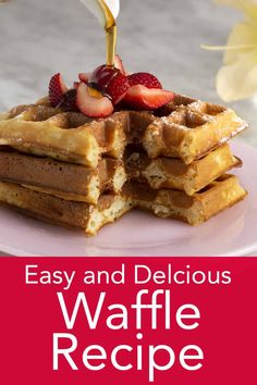 a stack of waffles sitting on top of a white plate with strawberries