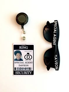 an id badge attached to a pair of sunglasses