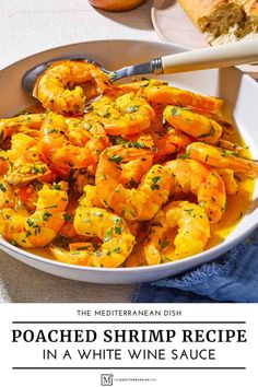 the mediterranean dish is loaded with shrimp and white wine sauce, served in a bowl