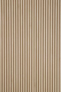 a close up view of the side of a wall made out of wood slats