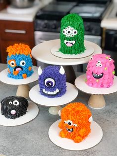 there are five cakes decorated to look like monsters