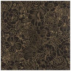 a black and gold rug with flowers on it