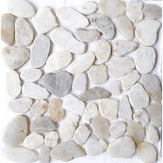 white and gray rocks are arranged in a square pattern