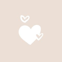 two white hearts on a light pink background