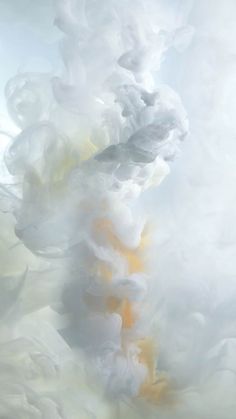 an abstract painting with white, yellow and grey colors in the air on a gray background