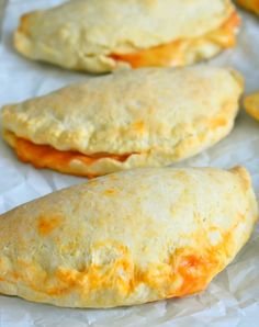 some food is laying on wax paper and ready to be baked in the oven for consumption