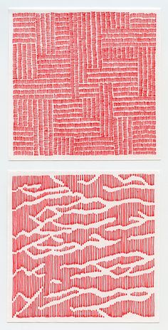 two red and white paper designs on a white surface, one with wavy lines in the middle